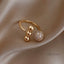 Triple Ball Ring made of Gold and Zirconium Dioxide