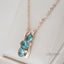 Elegant necklace made of blue crystal in gold